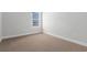 Bedroom featuring carpet, large window, and bright white trim at 2424 Campton Loop, Conway, SC 29527