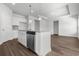 Well-appointed kitchen island with pendant lighting, stainless steel dishwasher, and granite countertop at 2424 Campton Loop, Conway, SC 29527