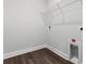 Laundry room area with wood floors and wire shelving at 2424 Campton Loop, Conway, SC 29527