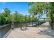 Scenic riverfront boardwalk features relaxing bench seating and views of the water and surrounding nature at 2443 Campton Loop, Conway, SC 29527