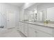Bathroom featuring dual vanity sinks with white marble countertops at 2476 Blue Crane Circle # 101, Myrtle Beach, SC 29577