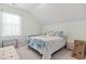 Inviting bedroom with a cozy bed, bright window, and stylish decor at 2476 Blue Crane Circle # 101, Myrtle Beach, SC 29577