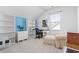 Bright bedroom featuring a large window, work space, and comfortable seating at 2476 Blue Crane Circle # 101, Myrtle Beach, SC 29577