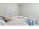 Comfortable bedroom featuring a patterned comforter and a double closet at 2476 Blue Crane Circle # 101, Myrtle Beach, SC 29577