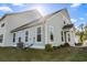 Exterior elevation of home showing backyard and air conditioning unit at 2476 Blue Crane Circle # 101, Myrtle Beach, SC 29577