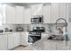 Close-up of the kitchen with stainless steel appliances and granite countertops at 2476 Blue Crane Circle # 101, Myrtle Beach, SC 29577
