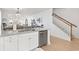 Kitchen island with stainless steel dishwasher and view into the open living space at 2476 Blue Crane Circle # 101, Myrtle Beach, SC 29577