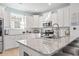 Kitchen featuring granite countertops, stainless appliances, and tiled backsplash at 2476 Blue Crane Circle # 101, Myrtle Beach, SC 29577