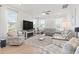 Bright living room with lots of light, comfortable seating, and a ceiling fan at 2476 Blue Crane Circle # 101, Myrtle Beach, SC 29577