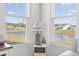 Window view of neighborhood pond with serene landscape at 2476 Blue Crane Circle # 101, Myrtle Beach, SC 29577