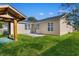 Backyard with a covered patio, green grass, and siding at 2483 Morlynn Dr., Myrtle Beach, SC 29577