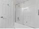 Bright bathroom featuring a white tiled bathtub at 2483 Morlynn Dr., Myrtle Beach, SC 29577