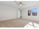 Neutral bedroom features a light fan and luxury vinyl plank flooring at 2483 Morlynn Dr., Myrtle Beach, SC 29577