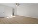 Spacious bedroom with wood-look floors, neutral colors and attached bathroom at 2483 Morlynn Dr., Myrtle Beach, SC 29577
