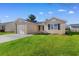 Charming single-story home with a well-maintained lawn and attached one car garage at 2483 Morlynn Dr., Myrtle Beach, SC 29577