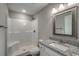 Modern bathroom featuring a walk-in shower and granite countertop vanity at 2582 Cottonwood Dr., Loris, SC 29569