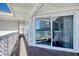 Spacious balcony with city view featuring a sliding door to the interior, offering seamless indoor-outdoor living at 300 Shorehaven Dr. # A4, North Myrtle Beach, SC 29582