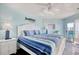 Serene bedroom with a queen bed, soft lighting, and access to a relaxing private balcony at 300 Shorehaven Dr. # A4, North Myrtle Beach, SC 29582