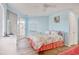 Bright bedroom features a comfortable bed, a dresser, and balcony access for enjoying fresh air at 300 Shorehaven Dr. # A4, North Myrtle Beach, SC 29582