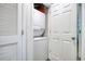 Convenient stacked washer and dryer in a dedicated laundry closet, maximizing space and efficiency at 300 Shorehaven Dr. # A4, North Myrtle Beach, SC 29582