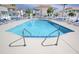 Community swimming pool with access stairs and lounge chairs at 300 Shorehaven Dr. # A4, North Myrtle Beach, SC 29582