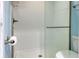 Clean, well-maintained shower with white tile and modern fixtures, offering a refreshing space at 300 Shorehaven Dr. # A4, North Myrtle Beach, SC 29582