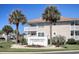Community sign displaying address of 300 Shorehaven Drive surrounded by palm trees and beautiful landscaping at 300 Shorehaven Dr. # A4, North Myrtle Beach, SC 29582