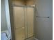 Bathroom featuring a clear glass shower and towel rack, offering a simple and functional design at 3158 River Bluff Ln., Little River, SC 29566
