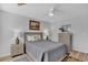 Charming bedroom features a queen bed, neutral walls, ceiling fan and decor at 3557 Chestnut Dr. # 3557, Myrtle Beach, SC 29577