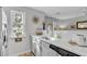 Contemporary kitchen with white countertops, stainless steel appliances, and natural light from the window at 3557 Chestnut Dr. # 3557, Myrtle Beach, SC 29577