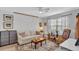 Cozy living room features comfortable seating, ceiling fan, and a decorative area rug at 3557 Chestnut Dr. # 3557, Myrtle Beach, SC 29577