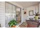 View of patio with sliding doors, a small bistro table, and a view into the home at 3557 Chestnut Dr. # 3557, Myrtle Beach, SC 29577