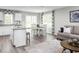 Modern kitchen and dining area, filled with natural light and neutral tones at 375 Myrtle Meadows Dr # 417A, Conway, SC 29526