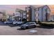 Apartment building with parking. The building has balconies and stairs. Multiple cars parked in lot at 3762 Citation Way # 1013, Myrtle Beach, SC 29577