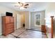 Cozy bedroom featuring wood-look floors, closet, and bright window at 3762 Citation Way # 1013, Myrtle Beach, SC 29577