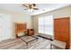 Bright bedroom with a ceiling fan, laminate floors and natural light from the window at 3762 Citation Way # 1013, Myrtle Beach, SC 29577