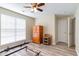 Bright bedroom with wood-look flooring and ceiling fan, ready for your personal touch at 3762 Citation Way # 1013, Myrtle Beach, SC 29577