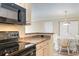Partial kitchen view flowing into the dining room, enhancing the sense of space and connection at 3762 Citation Way # 1013, Myrtle Beach, SC 29577