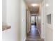 Bright hallway with wood-look flooring leading to various rooms at 3762 Citation Way # 1013, Myrtle Beach, SC 29577