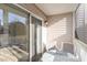 Cozy covered porch with table and chairs at 3762 Citation Way # 1013, Myrtle Beach, SC 29577