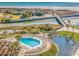 Beautiful aerial view of the community pool, boardwalks, and beach access with stunning ocean views at 415 Ocean Creek Dr. # 2202, Myrtle Beach, SC 29572