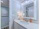 Updated bathroom featuring a modern vanity with sink and decorative fixtures at 415 Ocean Creek Dr. # 2202, Myrtle Beach, SC 29572