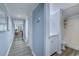 Hallway view to bathroom with walk-in shower and modern vanity at 415 Ocean Creek Dr. # 2202, Myrtle Beach, SC 29572