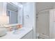 Bright bathroom featuring a walk-in shower and modern vanity with attractive countertop at 415 Ocean Creek Dr. # 2202, Myrtle Beach, SC 29572