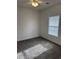 Bedroom with carpet flooring, a window for natural light, and a simple ceiling fan at 4155 Hibiscus Dr. # 103, Little River, SC 29566