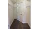 Walk-in closet featuring carpeted floor, shelving, and ample storage space at 4155 Hibiscus Dr. # 103, Little River, SC 29566