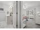 Ensuite bathroom and bedroom with sliding glass door and ceiling fan at 437 Colonial Trace Dr. # 2C, Longs, SC 29568