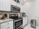 Modern kitchen with stainless steel oven, microwave and granite countertops at 437 Colonial Trace Dr. # 2C, Longs, SC 29568