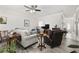 Comfortable living room with a light gray sofa, a leather recliner, and a ceiling fan at 437 Colonial Trace Dr. # 2C, Longs, SC 29568