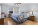 Bright bedroom features parquet floors, ceiling fan and woven furnishings at 4420 Eastport Blvd. # M12, Little River, SC 29566